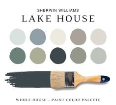 a paint brush with the words lake house painted on it and different shades of gray