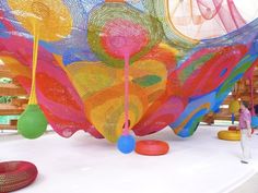 colorful sculptures are on display at an art exhibit