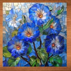 blue flowers with green leaves on a stained glass background