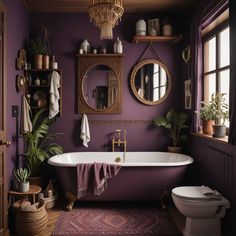 a bathroom with purple walls and a white bathtub in the middle, surrounded by potted plants