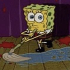 spongebob is cleaning the floor with a mop in his hand and it looks like he's crying