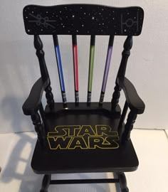 a darth vader rocking chair with star wars on it