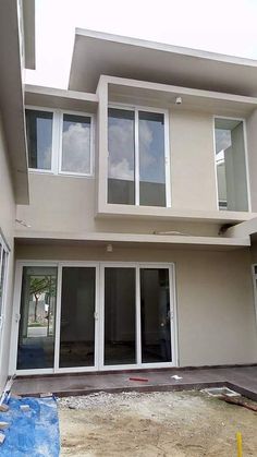 a house being built with windows and doors