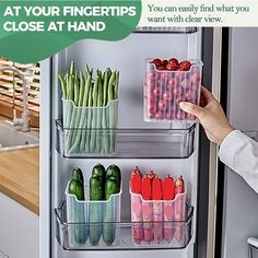 a refrigerator door is open and there are vegetables in containers on the shelves next to it