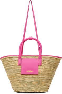 Hand-woven palm leaf and buffed leather tote in beige and pink. · Press-stud tab at rolled carry handles · Fixed crossbody straps · Patch pocket and logo hardware at face · Lanyard-clasp closure · Unlined · Logo-engraved gold-tone hardware · H11.5 x W20 x D6.5 Supplier color: Neon pink Jacquemus Bags, Gift Wishlist, Beige And Pink, Jacquemus Bag, Summer Purses, Bucket Handbags, Straw Tote Bag, Pink Body, Straw Bags