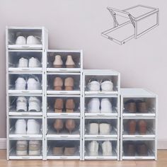 there are many pairs of shoes on the shelf in front of this wall decal