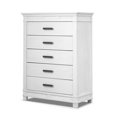 a white dresser with five drawers on it