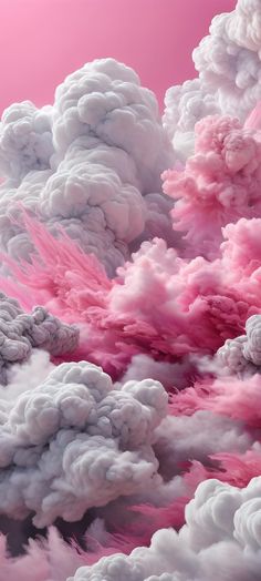 pink and white clouds are in the air with one cloud above it, while the other is