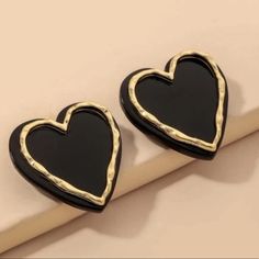 Black & Golden Shimmer Trimmed Heart Stud Earrings Perfect For Any Outfit, Any Occasion, And Any Season Individually Wrapped Material: Acrylic Gold Heart Stud Earrings, Heart Piercing, Gold Heart Studs, Gold Heart Earring, Stud Jewelry, Bow Earrings, Heart Decorations, Handcrafted Earrings, Heart Studs