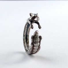 This cute raccoon ring is made of solid silver. It is unique by its shape and unusual appearance which will give you inexplicable charm. I oxidized this minimalist animal ring to give more sensitivity and expression. Brand Hover Handmade Jewelry Material - Sterling silver Color - Oxidized silver Weight - 5 gr [ STYLISH GIFT ] This exceptional raccoon gift is a perfect gift for Halloween costume parties, gift ideas, or any classic occasion. You can not be unnoticed by this fantastic piece of art. Minimalist Ring Gold, Raccoon Jewelry, Raccoon Ring, Quirky Rings, Raccoon Earrings, Raccoon Gifts, Raccoon Gift, Animal Ring, Cute Raccoon