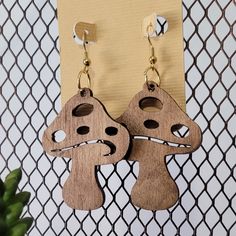 Handcrafted And Laser Wood Cut Mushroom Style Dangle Earrings. Earrings Are Assembled On Hypoallergenic And Gold-Toned Earring Wire. Color: Walnut Brown. Dimensions: Approximately 2 Inches In Length, 1.5 Inches In Width, And 3 Mm Thick. Original Design. Light Weight And Durable. Cute Boho-Hippie Style Earrings. Mushroom Style, Laser Crafts, Earring Wire, Laser Cut Earrings, Wood Cut, Design Light, Wooden Earrings, Style Earrings, Jewelry Lover