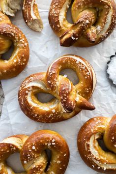 several pretzels with white powdered sugar on them