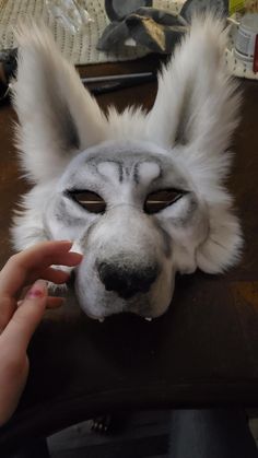 Made to order! A therian wolf or arctic fox mask. It is made on a simple mask base, with the snout, ears, eyes and more made from scratch by me. If you would like to see the materials I have them listed in the post ^^  however it does come unlined. Snow Leapord Therian Mask, Arctic Fox Mask, Cool Therian Mask, Marble Fox Therian Mask, Artic Fox Therian Mask, Arctic Fox Therian Mask, White Therian Mask, Wolf Mask Therian, Fox Therian Mask Ideas