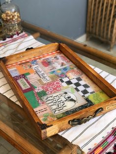 a wooden tray sitting on top of a table