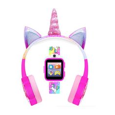 the pink unicorn headphones are next to an ipod