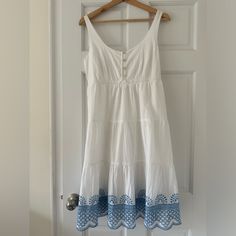 Nwot Seraphine Women's White Cotton Embroidered Maternity Sundress Size 4 Us White Blue Bought And Never Wore. Like New. See A Small Pinhole (Not Noticeable) Where Tag Was. Bust-7" Length-38" Waist-15" Hip-21" Measurements Are All Taken Flat Across And Are All Approximate Maternity Sundress, White Cotton, Sundress, White Blue, Blue White, Size 4, Midi Dress, Like New, Blue And White