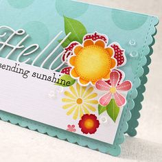 a close up of a card with flowers on it