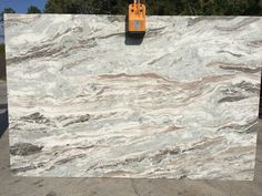 a large marble slab is being worked on