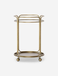 Round brass bar cart with a steel tube frame Circle Bar Cart, Bar Cart Small, Round Bar Cart, Brass Bar Cart, Circle Bar, Cordless Table Lamps, Brass Bar, Bathroom Ceiling Light