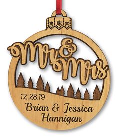 a wooden ornament with the words mr and mrs on it