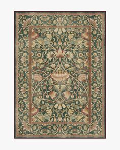 an intricately designed rug with flowers and leaves in green, gold and red colors