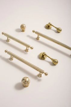 an assortment of brass handles and knobs