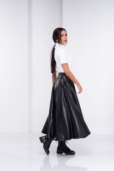 "Leather Skirt, High Waisted Skirt, Black Steampunk Skirt Super chic and modern, this leather skirt is a timeless piece to your wardrobe. With elastic waistband- loose and comfy design you can wear this piece to so many occasions. The model in the picture is 168cm. ⅼ 5.5 ft. tall and is wearing size S / color: Black 🌟 INFO: * Worldwide EXPRESS shipping - please provide a phone number for shipping documents * US Sizing XS to 4XL - body size chart available below * We offer customization to Perso Leather Skirt Long, Circle Maxi Skirt, Cyberpunk Clothing, Long Leather Skirt, Steampunk Skirt, Gothic Skirt, Boho Maxi Skirt, Cyberpunk Clothes, Stylist Outfit