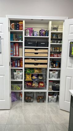 an organized pantry with lots of food in it