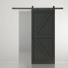 an open barn door in a white room