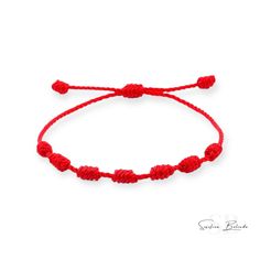 SEVEN KNOT RED STRING BRACELET Seven knot red string bracelet. Wear on the left wrist for protection against bad energy. One Size Fits Most 7 Knot Red Bracelet Diy, Adjustable Red Bracelet With Sliding Knot, Red Minimalist Bracelets With Adjustable Cord, 7 Knot Red Bracelet, Adjustable Red Braided Nylon Bracelet, Bad Energy, Red String Bracelet, Red String, String Bracelet