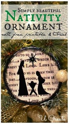 a nativity ornament hanging from a christmas tree with the words,'simply beautiful