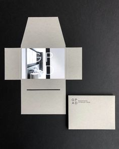 an architectural brochure designed to look like a house, with the door open