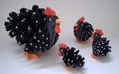 a group of black and white toy chickens next to each other