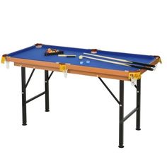 a blue pool table with cues and cues on it