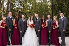 a bride and groom with their bridal party