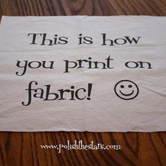 this is how you print on fabric with a smiley face in the center and words below it