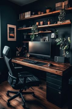 A Dark Moody Small Home Office featuring a sleek, minimalist desk setup with wooden shelves, plants, and warm lighting embodies the essence of Dark Scandinavian Minimalism, perfect for those seeking Moody Office Ideas for a Dark Modern Office or a Home Office Dark design. Dark Minimalism Interior, Home Office Setup Small Spaces, Dark Modern House Interiors, Moody Office Ideas, Small Moody Office, Dark Modern Interior, Home Office Decor For Men, Minimal Office Design, Dark Scandinavian