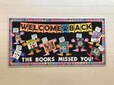 a welcome sign for the book's missed you class on display in a hallway