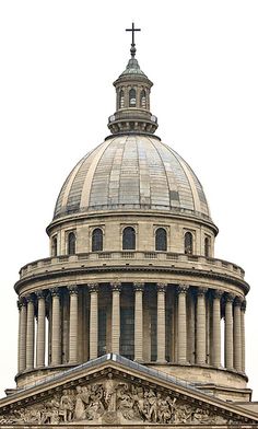 an old building with a cross on top