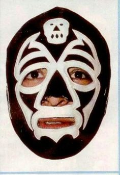 a white and black mask with a skull on it