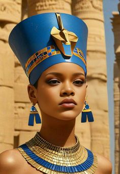 an egyptian woman wearing a blue and gold headdress in front of the temple