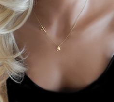 "THE CROSS AND INITIAL NECKLACE This sweet and delicate necklace comes with one initial and a sideways cross. ✦ 14k gold filled or sterling silver chain and components ✦ Script style premium gold vermeil or sterling silver letter charm- approximately 3/8\" ✦ Gold vermeil or sterling silver cross (23mm × 10mm) ✧ Necklace is shown at 18\" ✦ C A R E ∙ T I P S Although the initial disc, chain, rings and clasp are all gold filled or sterling silver, the gold letter charm is plated and should not be w Cheap Personalized Cross Pendant Jewelry, Cheap Personalized Silver Cross Necklace, Cross Necklace With Date, Cheap Gift Cross Necklace, Cross Necklace With Initial, Affordable Cross Pendant Necklace For Anniversary, Affordable Personalized Cross Pendant Jewelry, Cheap Personalized Cross Necklace, Cheap Personalized Crucifix Jewelry