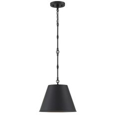 a black pendant light hanging from the ceiling