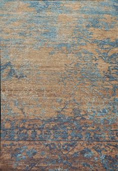 an area rug with blue and brown colors