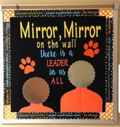 a bulletin board with the words mirror, mirror on the wall there is a leader in us all