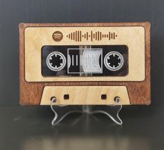 an old fashioned wooden radio with two dials