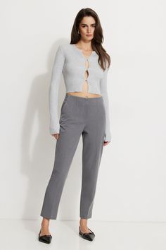 Fit right into these high-waisted slim-fit pants - Designed to be fitted with a stretch for easy dressing. Features - Zipper fly - Two-pocket styling - Creased legs - Back mock welt pockets Size & Fit - Slim leg - High-rise: 11.25" - Inseam Length: 27.5" Materials & Care - 67% Polyester, 29% Rayon, 4% Spandex - Machine wash, cold - Imported Romantic Classic, Theatrical Romantic, Slim Leg Pants, Easy Dressing, Pants Design, Slim Fit Pants, Fit Pants, Slim Leg, Grey Women