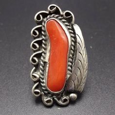 "VINTAGE NAVAJO RING DESCRIPTION: This classic ring features a lovely specimen of old red Mediterranean coral. The gemstone is secure in smooth bezel, on a foundation of heavy gauge vintage sterling silver. This ring will be a treasured addition to your collection of fine vintage Native American jewelry. MEASUREMENTS: Ring face measures 1 3/8\" x 5/8\" RING SIZE: 6 WEIGHT: 7.5 grams SIGNED: BJ STERLING: unmarked, verified sterling silver" Vintage Jewelry With Large Stone In Open Ring, Antique Sterling Silver Ring With Large Stone, Vintage Sterling Silver Ring With Large Stone, Vintage Sterling Silver Rings With Large Stone, Vintage Red Jewelry With Polished Finish, Vintage Silver Ring With Large Stone, Vintage Engraved Red Ruby Ring, Vintage Engraved Ruby Ring, Vintage Red Jewelry Stamped 925