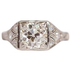 Ring Size: 5.75 Metal Type: Platinum [Hallmarked, and Tested] Weight: 3.3 grams Center Diamond Details: GIA REPORT#2201969218 Weight: 1.50 carat Cut: Old European Brilliant Color: J Clarity: VS2 Side Diamond Details: Weight: .10 carat, total weight Cut: Old European Color: G Clarity: VS Finger to Top of Stone Measurement: 6mm Condition: Excellent Art Deco Gia Certified Diamond Ring For Formal Occasions, Brilliant Engagement Rings, 1920 Art, 1920 Art Deco, Platinum Diamond Engagement Rings, Platinum Engagement Rings, Art Deco Jewelry, Brilliant Diamond, Engagement Rings Sapphire