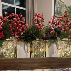 mason jars filled with berries and pine cones